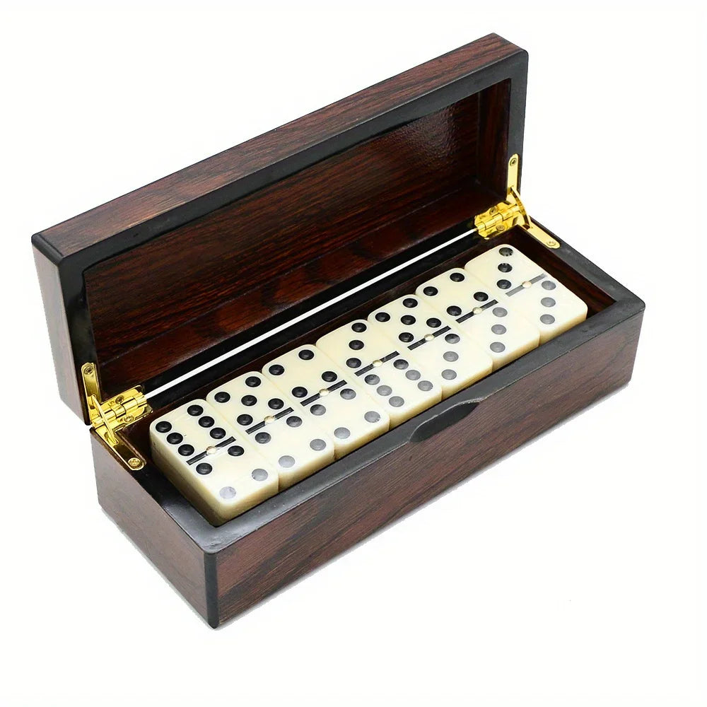 Coffret brillant ouvert avec 28 dominos double-six ivoire
